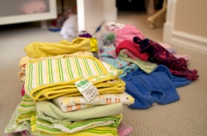 Piles of Baby Clothes